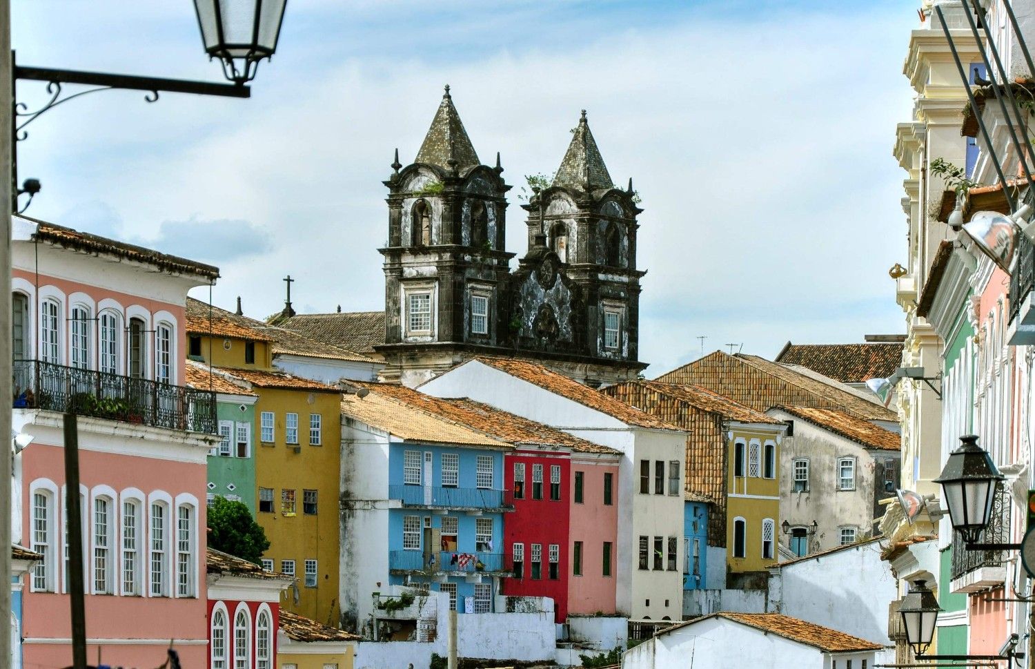 Colourful Buildings In Front Of A Church In Pelourinho