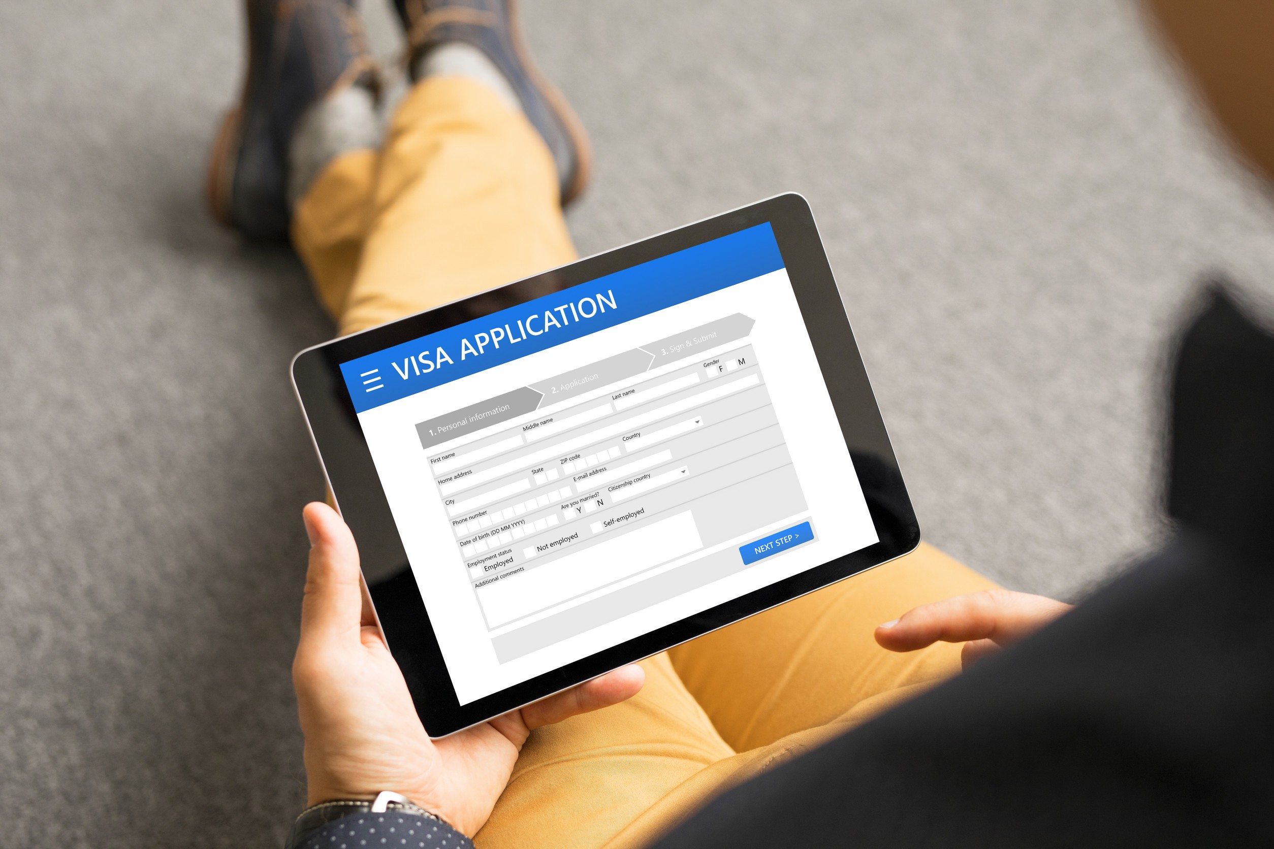 Man Applying For A Visa Online
