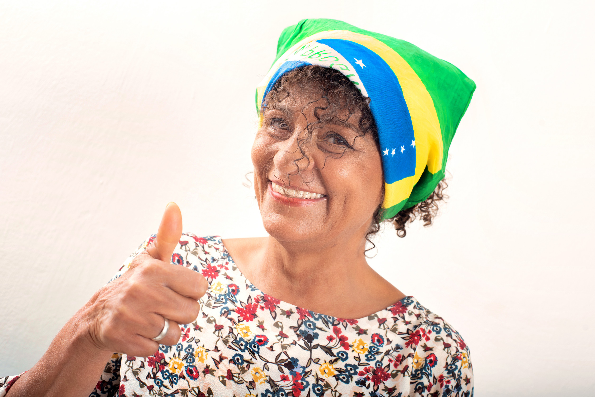 Portrait Of Mature Smiling Brazilian Woman Wearing A Bandana
