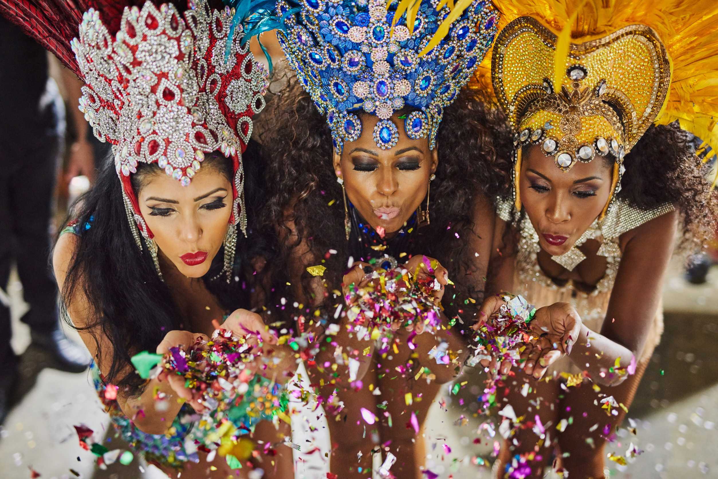 Samba Dancers Blowing Confetti At Carnival
